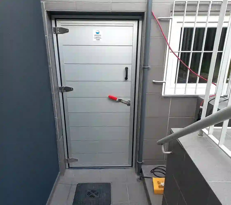 Porte anti-inondation pour local technique